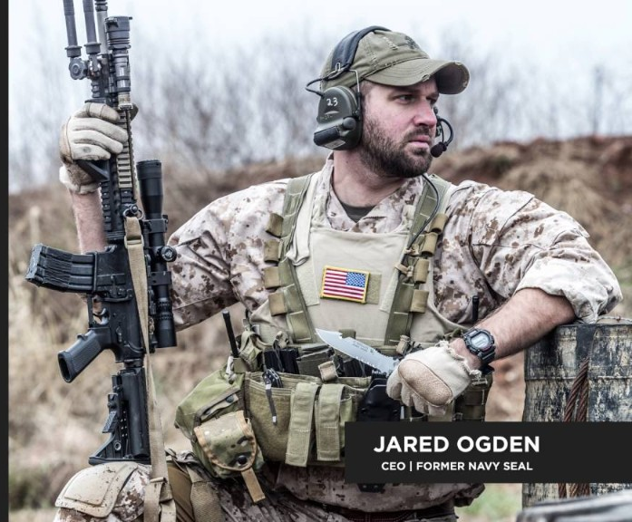Jared Ogden, former Navy SEAL and Founder and CEO of Triumph Systems, in tactical gear